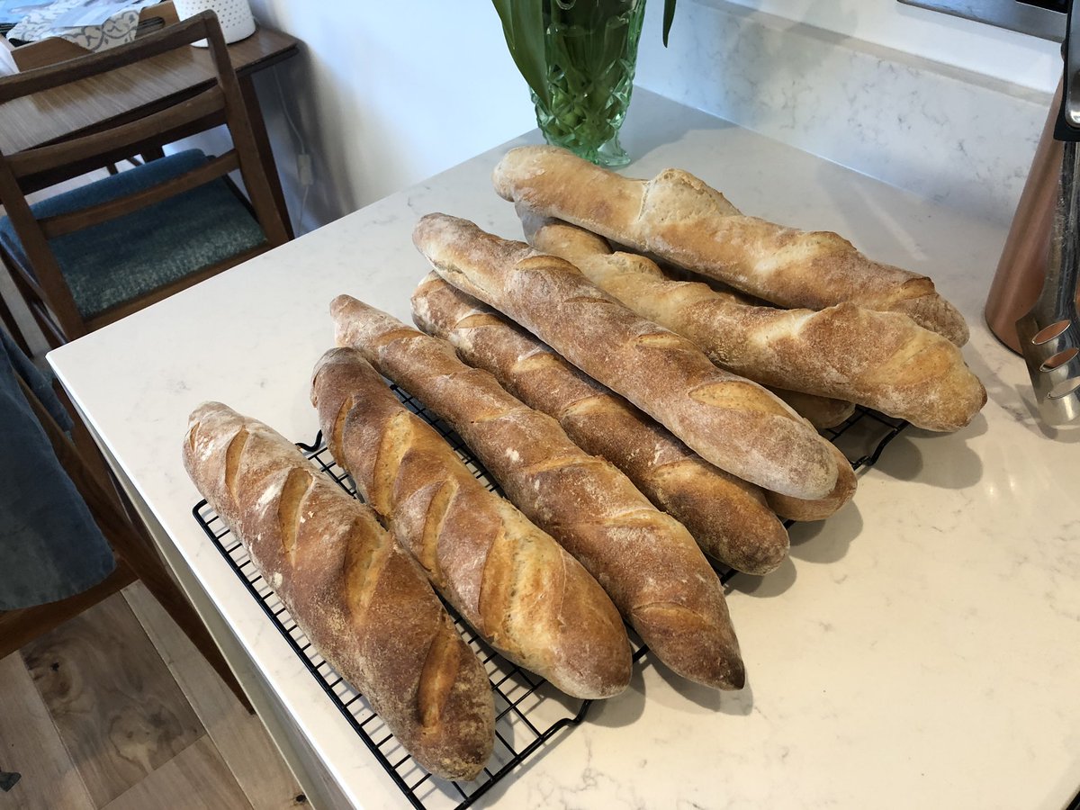 hanny_bakes's tweet photo. Turned the kitchen into a bakery today! Tried out @RichardBertinet poolish French baguettes. Going to freeze half of the baguettes as they are part baked. Have friends round for dinner tonight so may send them home with a baguette party bag! #bread https://t.co/6gVomNwcgy