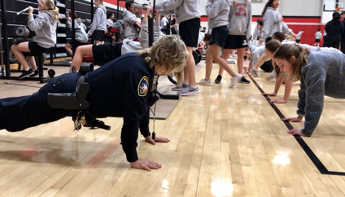 Looks like North’s new SRO, Officer Angie, is a GREAT FIT! Showing our athletes how to plank. 💜 <a href="/CMSNorth/">Coppell MS North 🐾</a> <a href="/CMSNsports/">Coppell North Sports</a>