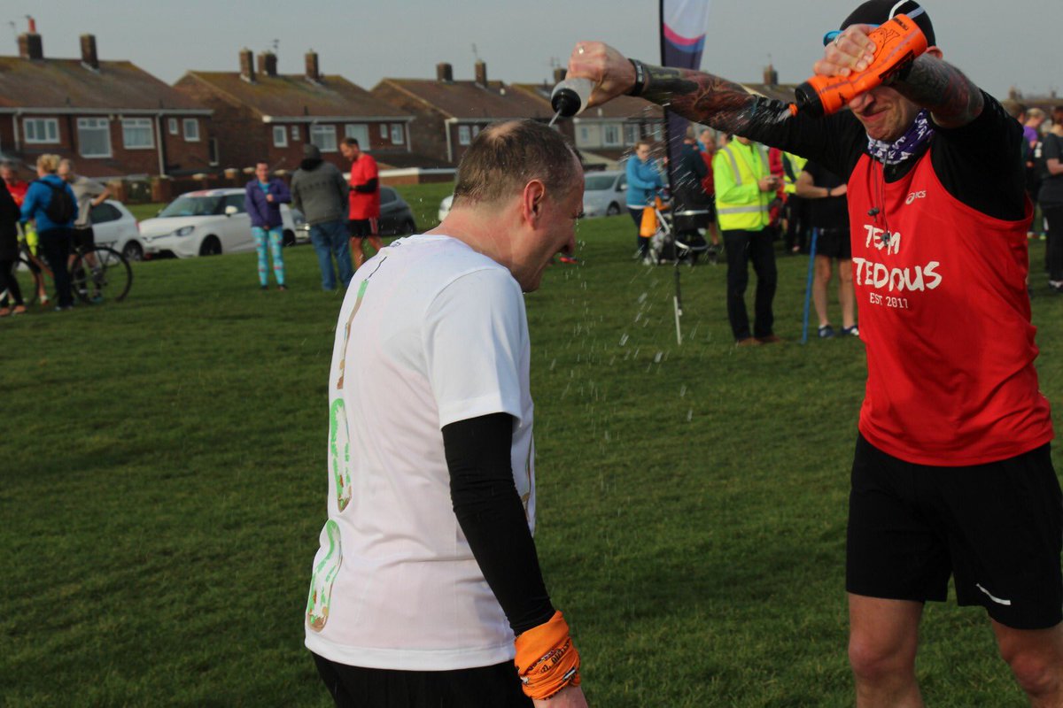 TediousTeam's tweet photo. A GREAT morning at @SShieldsparkrun to celebrate @MrBlackNWhite’s 100th parkrun!
Guard of honour? Nah, we soaked him...then drank coffee, ate cake & a full English 😂
#loveparkrun #ukrunchat #teamtedious https://t.co/CEoediEgpG