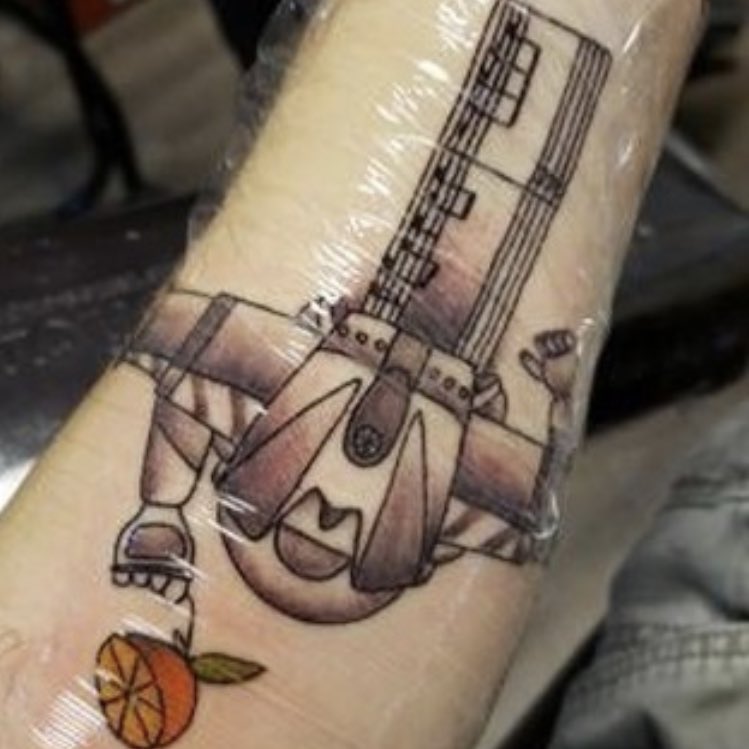 gwavagwava's tweet photo. We have the most incredible fans! They’re out here getting tattoos of our songs 🍊🧡🤯 

“I want to fly away” https://t.co/3phCKjPVmW
