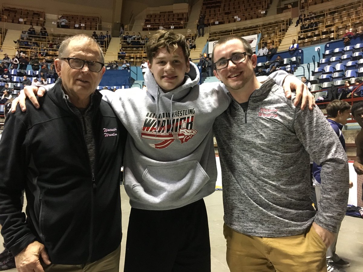 Warwick Junior David Hnasko (center), shown with coaches Ned Bushong (left) and Ian Stoeckl (right), decks New Oxford’s Luke Lardarello In 3:39 to place 5th in the D3 Triple A 170 pound weight brackets. ⁦<a href="/WarwickWarriors/">WarwickAthletics</a>⁩ ⁦<a href="/SteckStackTweet/">Ian Stoeckl</a>⁩
