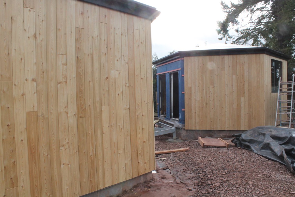 TheIADCompany's tweet photo. Sneak a peak at the classroompods the cladding is going on. Not long now!!! #podprogression #considereddesign #bespokesolutions #biophillic #biophillicdesign #honeycomb #education #wales #siberianlarch #formandfunction https://t.co/m4fHW5L9KN