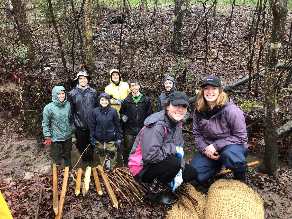 KassaKayla's tweet photo. First there were two, then there were 8. NCSU grad students showed great numbers volunteering for another stream restoration event today and had a blast in the rain. 
#GoPack #ncsubae https://t.co/l2azyboa58