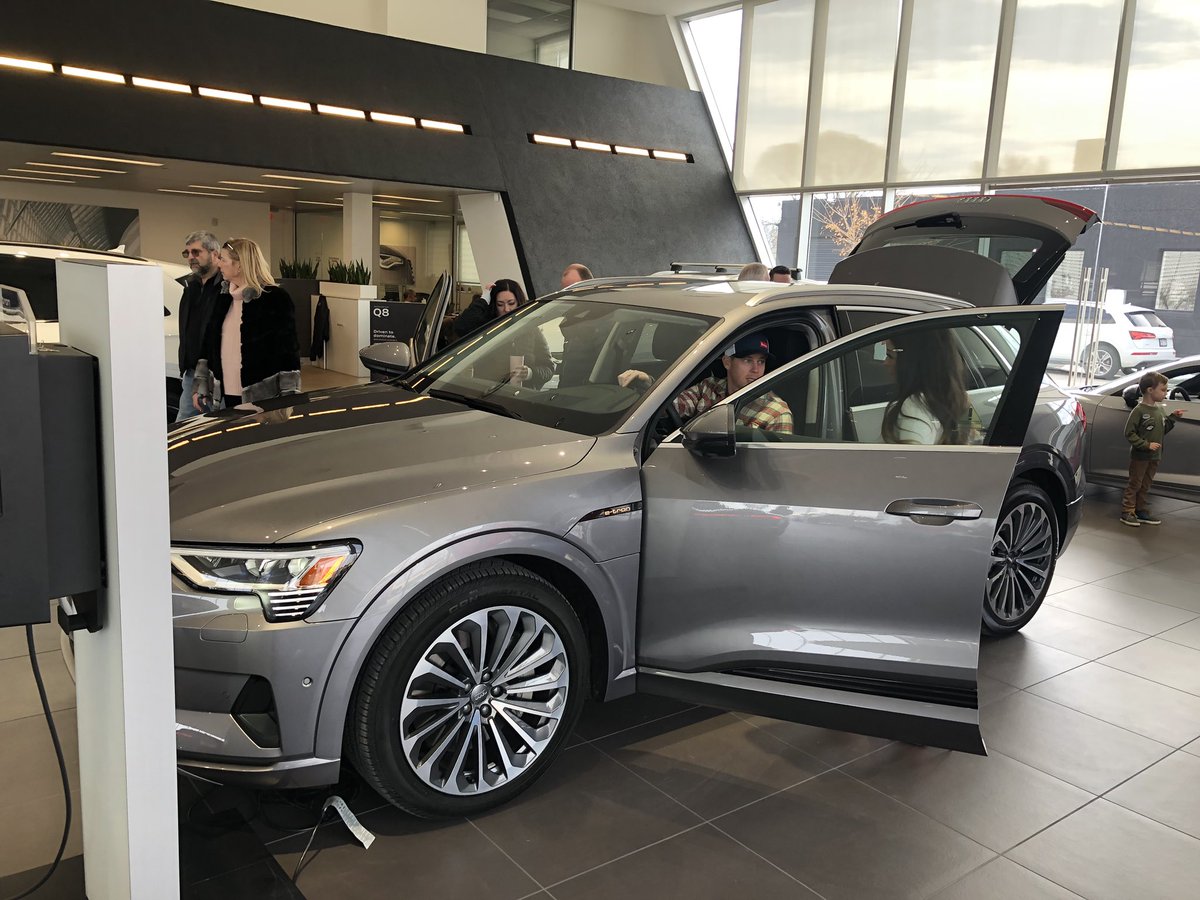 spencerhall's tweet photo. Getting a sneak peek at the spicy new all-electric @Audi e-tron at @StrongAudi in SLC. Excited to have these on the roads soon. https://t.co/yXG6SVUzhT