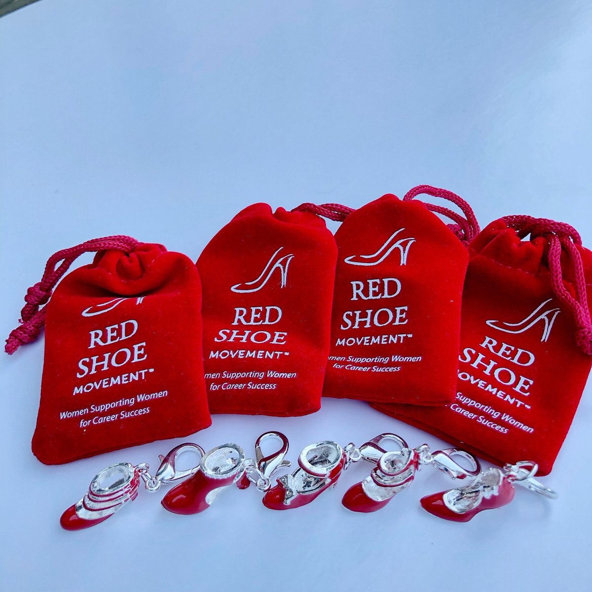 RedShoeMovement's tweet photo. Want to get your team excited? Plant the first seed of self-empowerment with our @RedShoeMovement charms! Get them for the women in your network! https://t.co/SbzcwvZhHY #RedShoeTuesday #RedLookBook https://t.co/Gj27P5rGvi