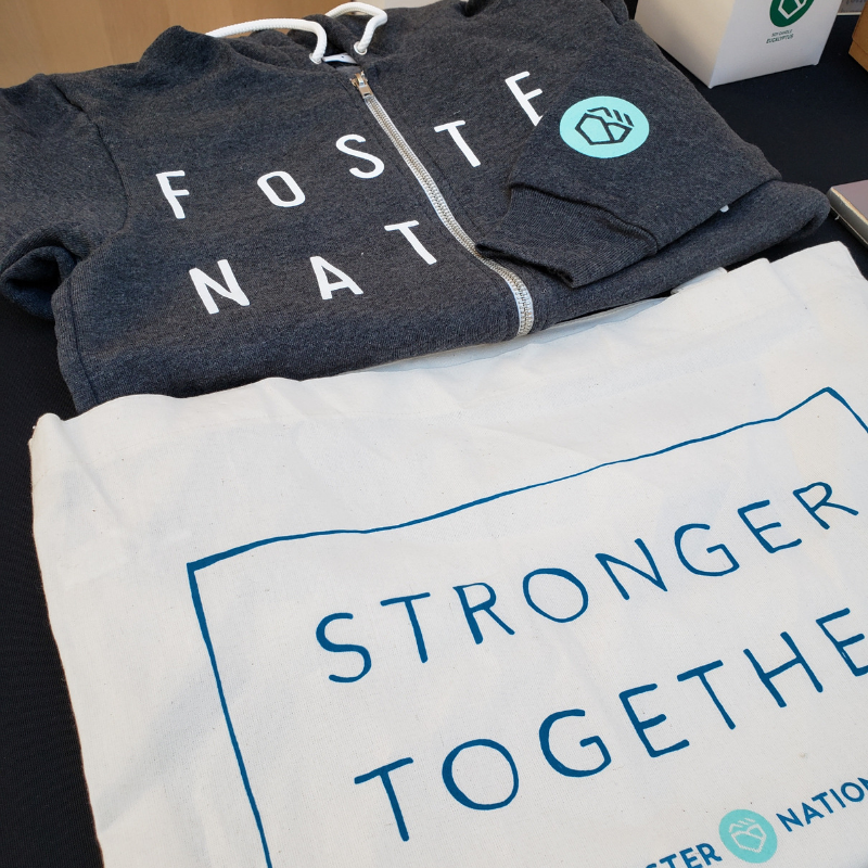 TheFosterNation's tweet photo. There are so many ways you can support & represent #FosterNation! We have full-zip hooded sweatshirts to warm you up, reusable tote bags for those weekly grocery trips & so much more. 100% of the proceeds of this item support our nation’s #foster youth: https://t.co/pOTtazgLEg https://t.co/OtsEL66p7n