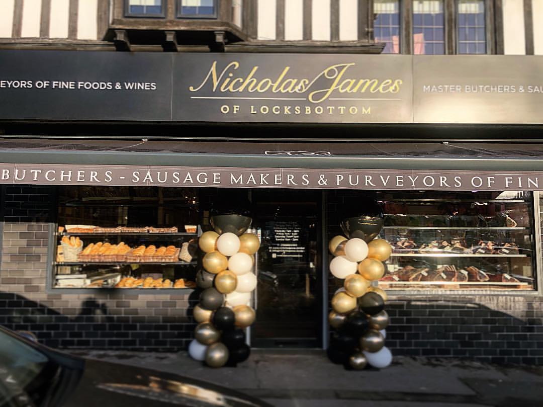 Aluminium glazing, door &amp; electronic awning designed supplied and fitted for Nicholas James of Locksbottom. More information SupremeShopfronts.com