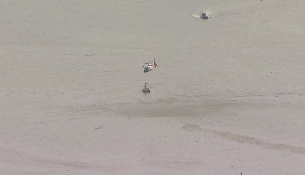 .@abc13houston had live images coming in over Trinity Bay. USCG helicopter and boats have arrived in what looks like a debris field in the water. #5Y3591