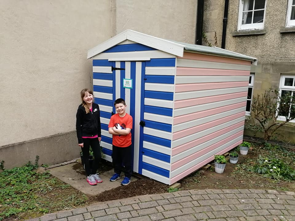 MontellaA1's tweet photo. A huge thank you to Ella, Monty, Karen &amp; Zoey for help in 'brightening' up this tired old girl for our Gardening Club Activities! Thanks also to the wonderful Estates Team at Myddelton College for erecting and refelting our new shed.   @RHSSchools @MyddeltonCol https://t.co/zwEUdy0hvT