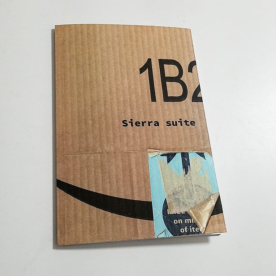 BlueBluerBooks's tweet photo. Got a proof copy of the new, POD edition of Sierra Suite today! It's a facsimile of the typewritten 'cartonera' edition I've been working on, in which each copy is bound in covers made from Amazon shipping materials... I'll share ordering info soon, plus an e-book version. https://t.co/CUMHLyFhoz
