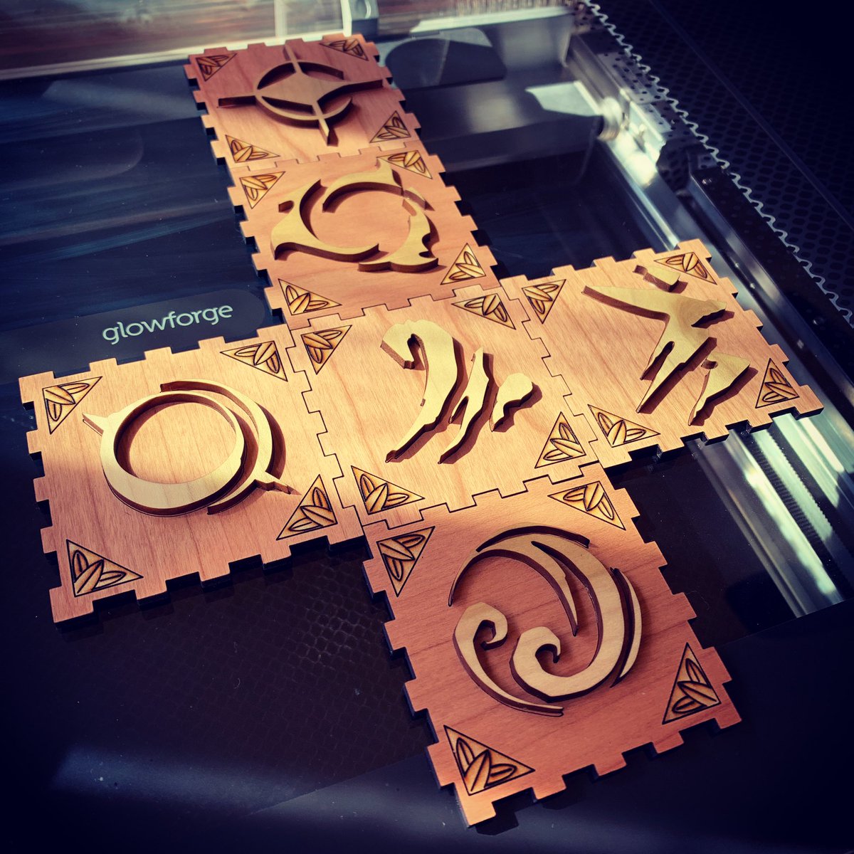 jumekubo's tweet photo. My kids and I watch “Dragon Prince” and are big fans of “Avatar: the Last Airbender”. Couldn’t help it. Had to make a Primal Cube. 🤪 #dragonprince #primalcube #avatar #lasercut #illustrator #art #design @glowforge @adobe https://t.co/kdXFuwgZrU