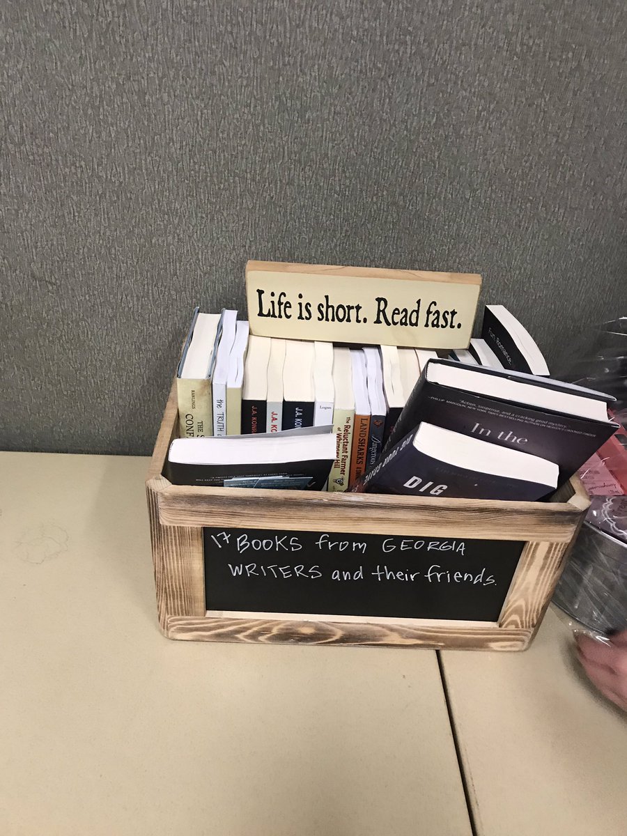 lindasands's tweet image. So many books in our basket it overflowed! We scored the most money for charity at Murder in the Magic City.  #writersgiveback  #booksForGood