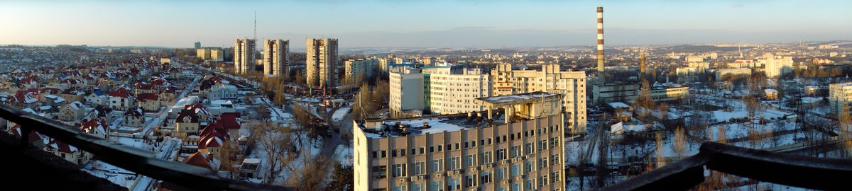 veek's tweet photo. See those three tall towers at center-left? The Khrushchevka building where I grew up, one of those block-wide ones five stories high, is next to the middle one. #chisinau #telecentru https://t.co/bVcDoJJx41