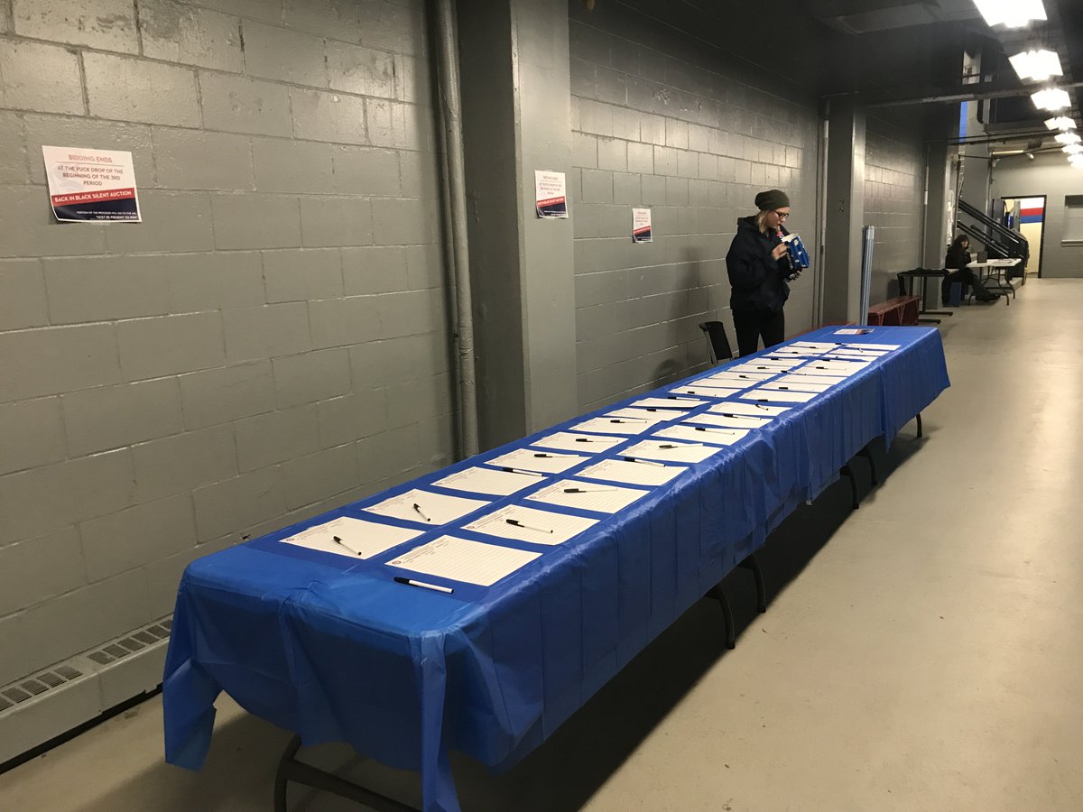 bucshockey's tweet photo. Don't forget to check out all the action in the East Hallway! The Silent Auction, @ARLIowa, @PetSmart and more!
#BucsHockey
#DMvsYNG https://t.co/FuadUFUrLm