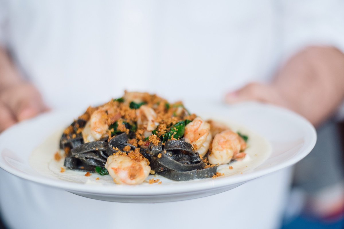 Fettuccine Nero features house-made ribbons of pasta flavored with squid ink enhanced by wild Gulf shrimp, garden spinach &amp; n'duja—a subtly spicy guest favorite.
#ColtivareHouston #AgricoleHouston