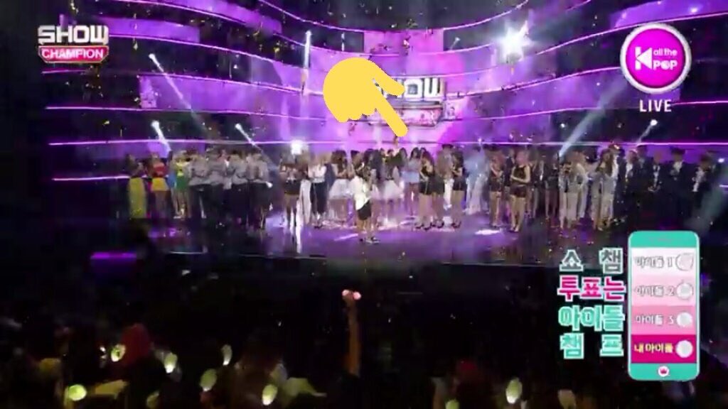 apink standing on the far backside of the stage, without expecting that they are going to win 