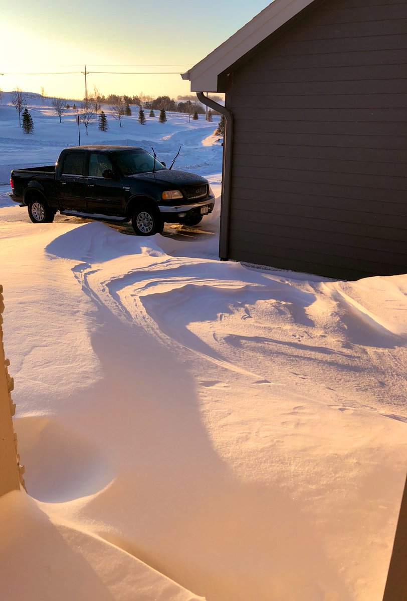 HatchDebbie0's tweet photo. Snowdrifts off the front porch.  SIX cancelled flights in one week.  Must be Nebraska... https://t.co/XG85pxjw5x