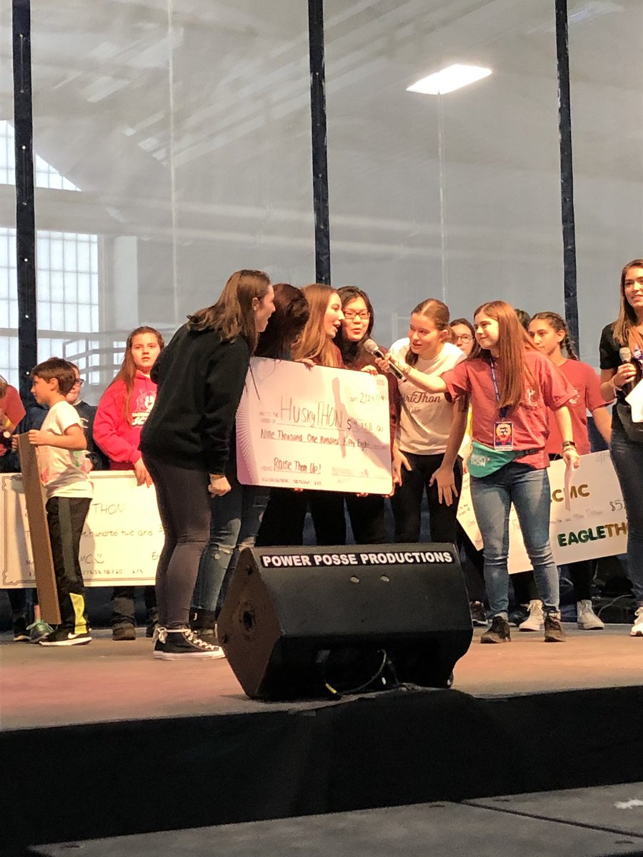 Mr_Mulcahy's tweet photo. So proud to see FHS students on stage at UConn’s HuskyTHON this morning! Their hard work on SpiriThon contributed over $9K to CT Children’s Medical Center. UConn’s overall event raised over $1.3 Million! @1FarmingtonHS @MrSkerkerMath #FPSleadingtheway https://t.co/eXQZF80Xin