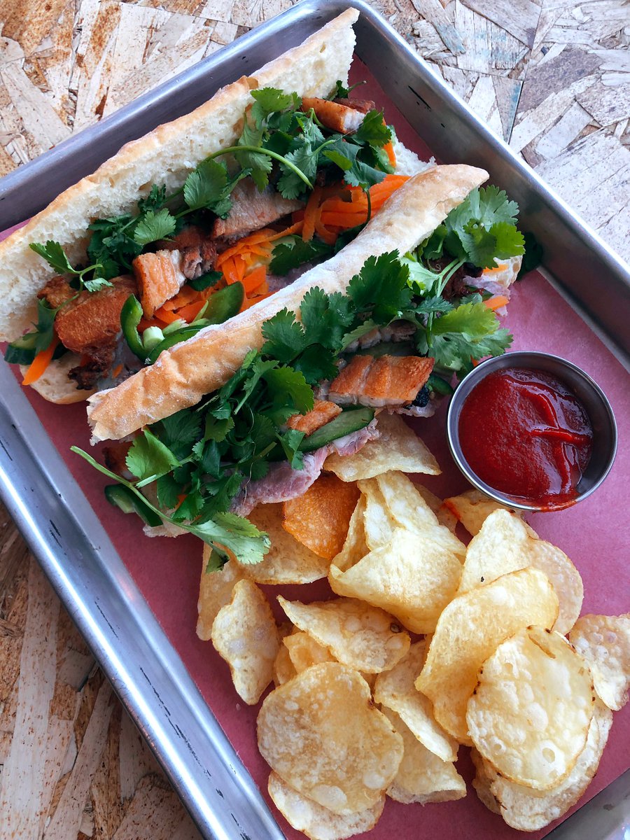 Tonight’s feature! Pork belly &amp; house terrine banh mi! Pickled carrot, cukes, jalapeño, &amp; cilantro, served with a side of sriracha and chips! The perfect pairing to our dry-hopped NEIPA cask from @seachangebrewingco! Draught beer is just $5 all night, 5-10pm!