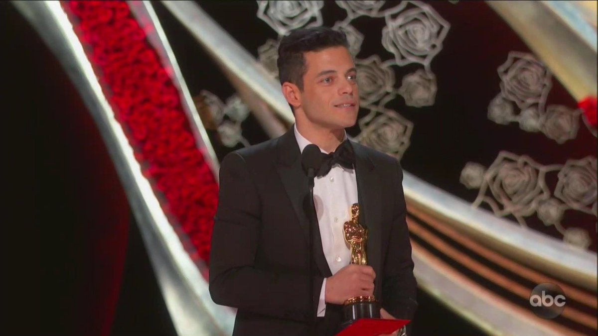 enews's tweet photo. "I think to anyone struggling... we made a film about a gay man, an immigrant, who lived his life just unapologetically himself. The fact that I'm celebrating him and this story with you tonight is proof that we're longing for stories like this." - Rami Malek #Oscars https://t.co/0Q8cftUHY2
