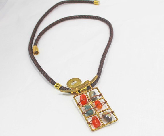 hvaradhan's tweet photo. Statement Brass Pendant, Orange https://t.co/t96kCfNd5G via @EtsySocial #beaded necklace #metal beaded ncklace #rectangularpendant #bras https://t.co/ZkfIv2NNio