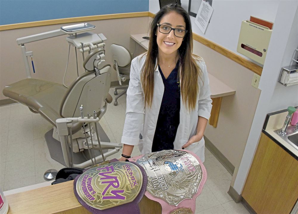 AEWrestle's tweet photo. Congrats AEW Women's Champion, @DrBrittBaker, who never gave up on her dream, and recently graduated from dental school!  #WomenofAEW #ChangeTheWorld https://t.co/ikifPkgwmT