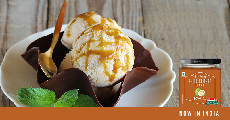 SunkistIndia's tweet photo. It's ice cream time! #SpreadTheFruit and indulge in something sweet. Pour our Guava spread and a 1/4 cup water into a saucepan over medium heat. Stir till the jam melts into a smooth sauce. Drizzle it on a scoop, &amp; bingo! 
Grab your #SunkistFruitSpreads at a @BigBazaar near you. https://t.co/zxmdeUTQ0x