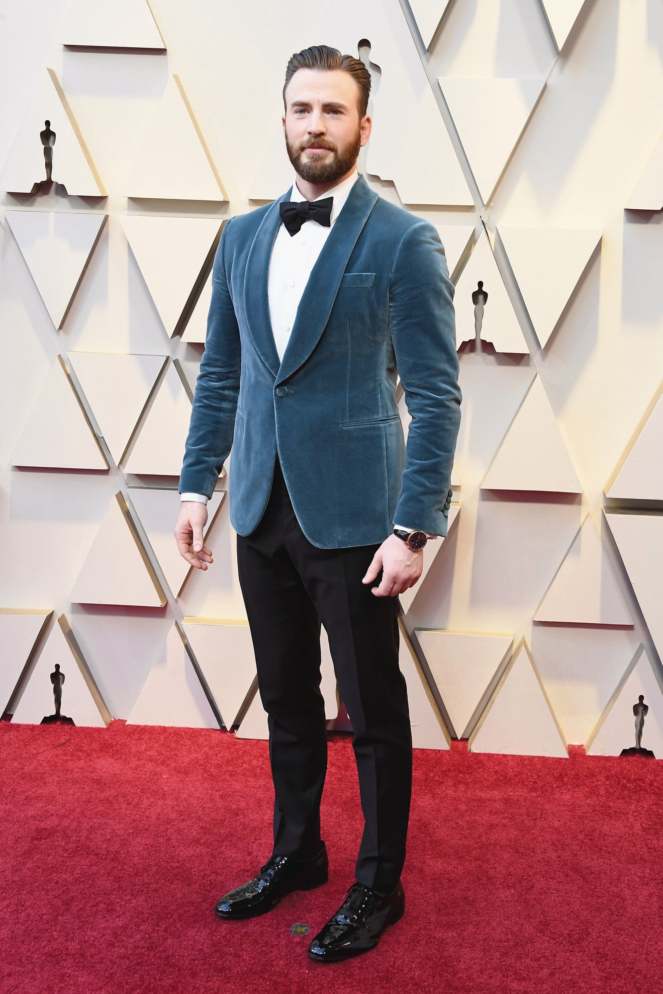 FERRAGAMO on X ChrisEvans looking dapper at the AcademyAwards2019 dressed in a made to measure blue velvet collar tuxedo paired with a bow tie and classic patent lace up shoes by SalvatoreFerragamo Os...