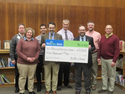 NexTier's tweet photo. On February 14th we had the privileged of visiting with Trinity Christian School. Trinity Christian School is a private, coeducational, classical Christian school in Forest Hills #travelingcheck #nextiergivesback #workingforyou #communityfirst #EITC #financialliteracy https://t.co/m8B5K4hABU