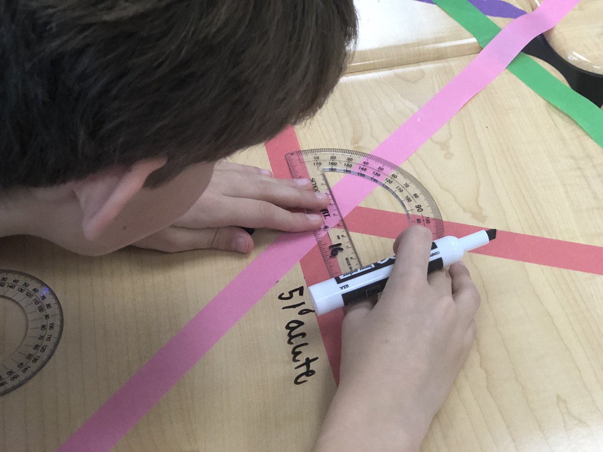 Saanderson09's tweet photo. Identifying and measuring angles in room 210. #5thGrade #NoPaperNeeded #SoManyAngles @KEScoyotes https://t.co/Y6uGr3NN21