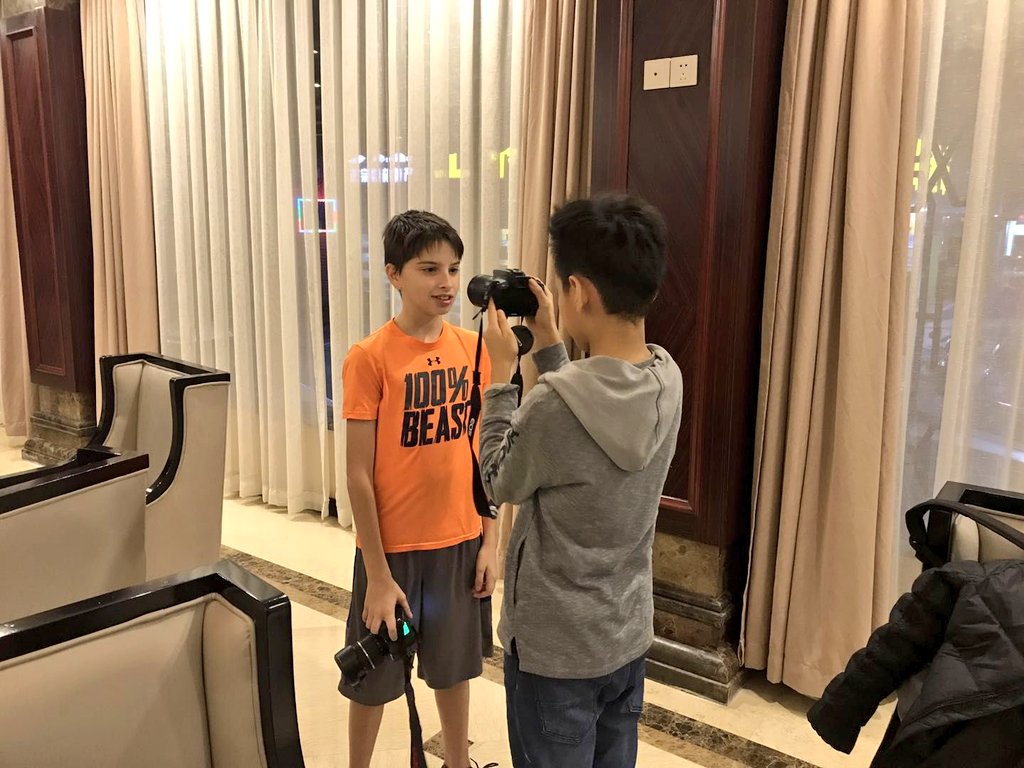 HarrowHKExpeds's tweet photo. The pupils on the Yangshuo Trip squeeze in a quick photography lesson while getting checked into their hotel. #EfficientUseOfTime #LiAWeek @Harrow_HK https://t.co/2lax0WSIlZ