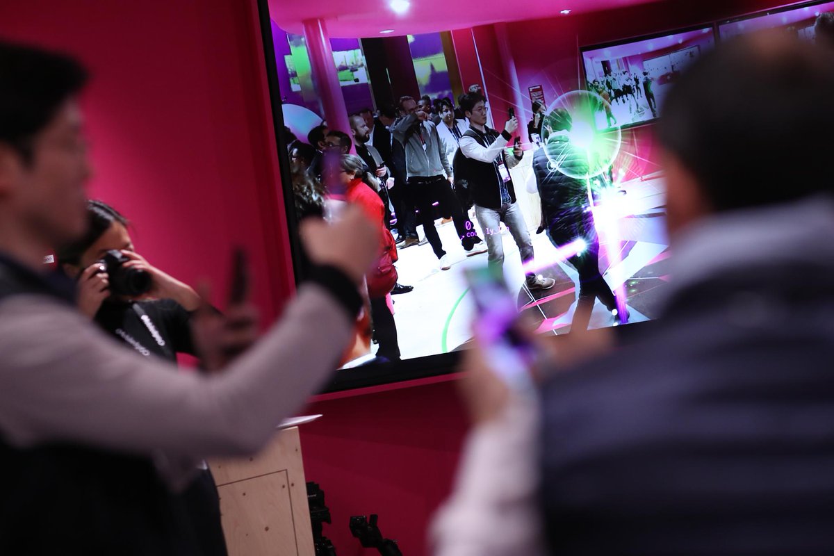 NianticSpatial's tweet photo. Our partner, @Telekom_group, is showing our innovative #multiplayerAR demo #CodenameNEON on stage right now at #MWC19. Catch all the details during their live stream: https://t.co/YMRo2xTJa2 https://t.co/eVJqcpVBGO