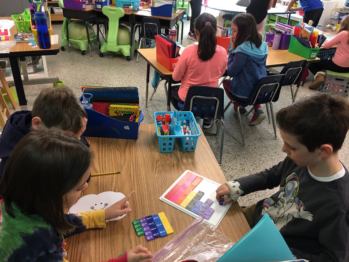 Equivalent fractions fun at CHES   4th graders pair up to learn in Mrs. Zeilinder’s class.
