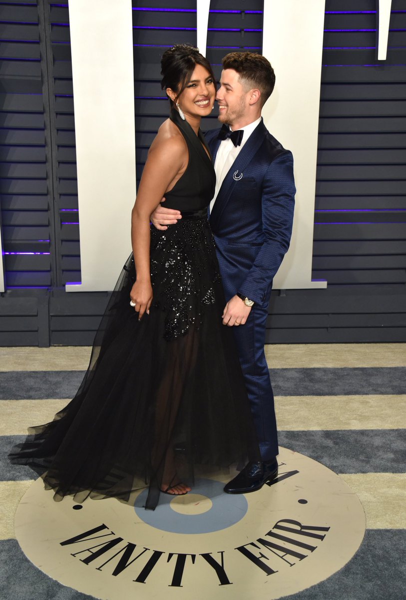 InStyle's tweet photo. Love was in the air last night at the Vanity Fair #Oscar after party. 💕 See some of the cutest couples on the carpet. https://t.co/2GqpzuGU1q