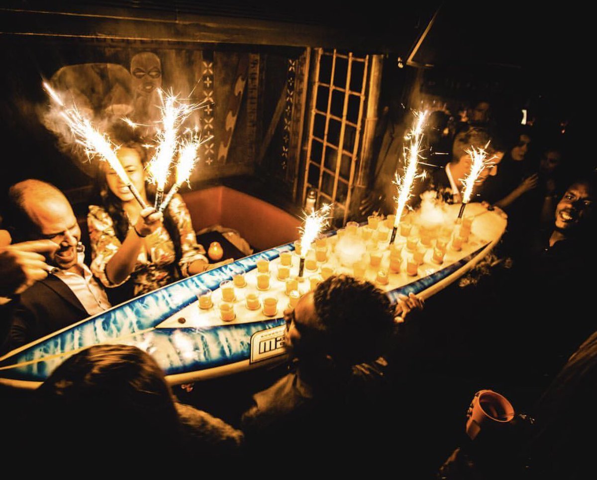 🎉🔥Aloha Monday!🔥🎉 Start your week off riding our tropical surfboard of shots 🏄‍♀️