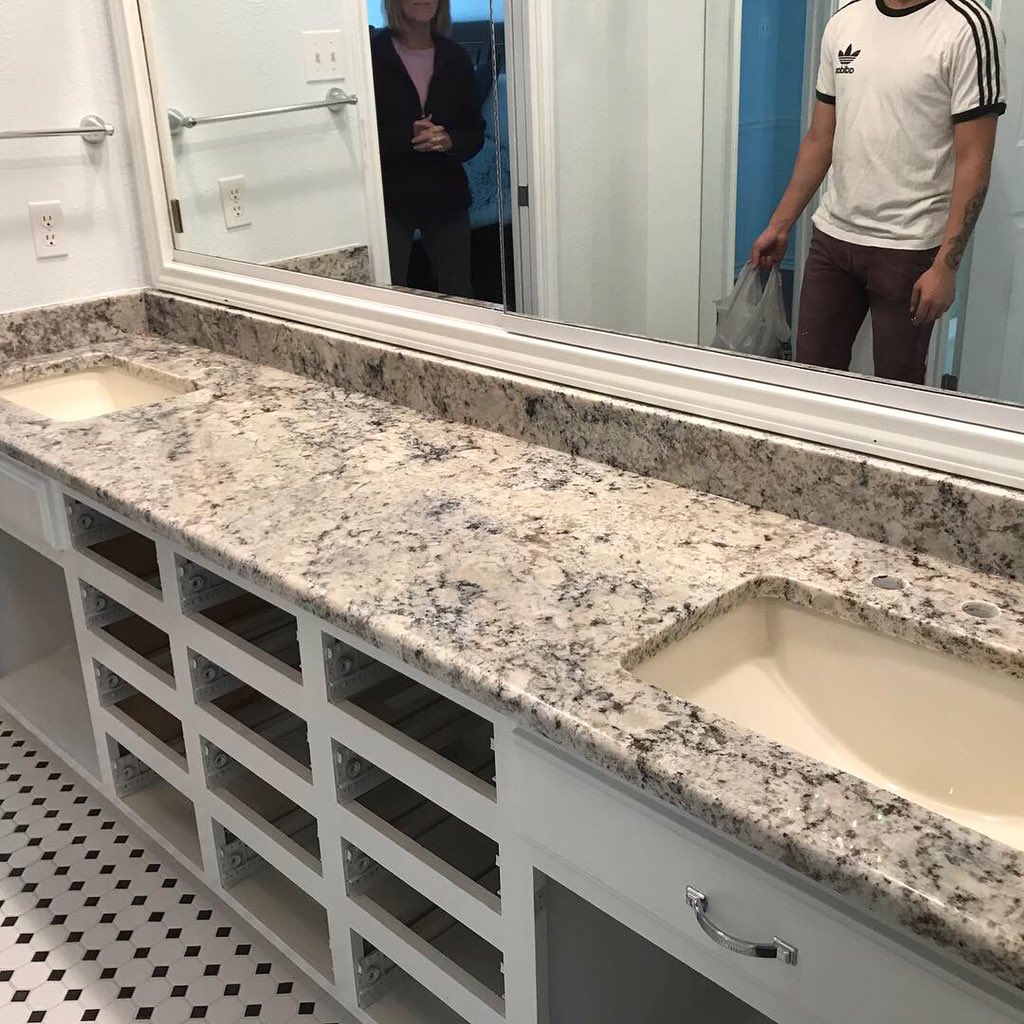 GraniteBros's tweet photo. Finished installing this beautiful #bathroom. The #granite choice was White Ice and the #sinks are cream colored. https://t.co/D0qUo56g9t
