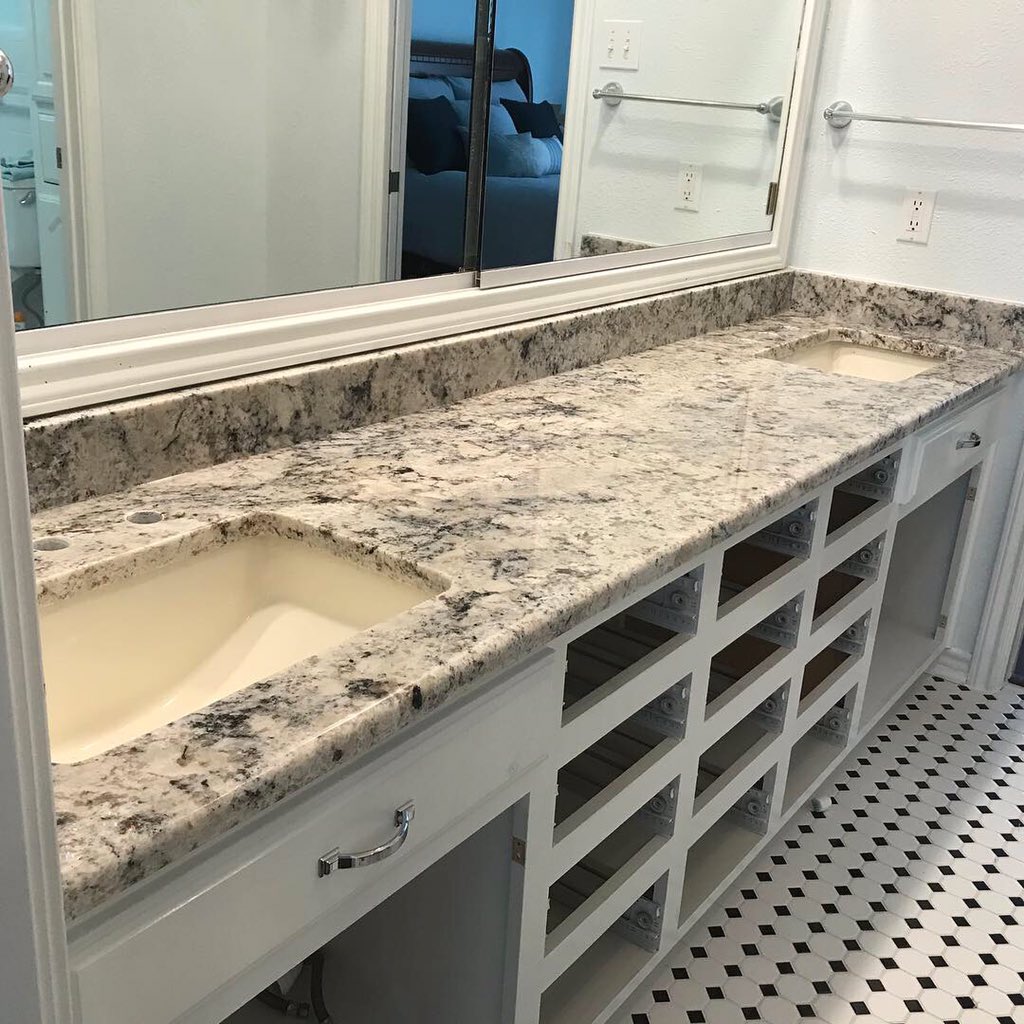 GraniteBros's tweet photo. Finished installing this beautiful #bathroom. The #granite choice was White Ice and the #sinks are cream colored. https://t.co/D0qUo56g9t
