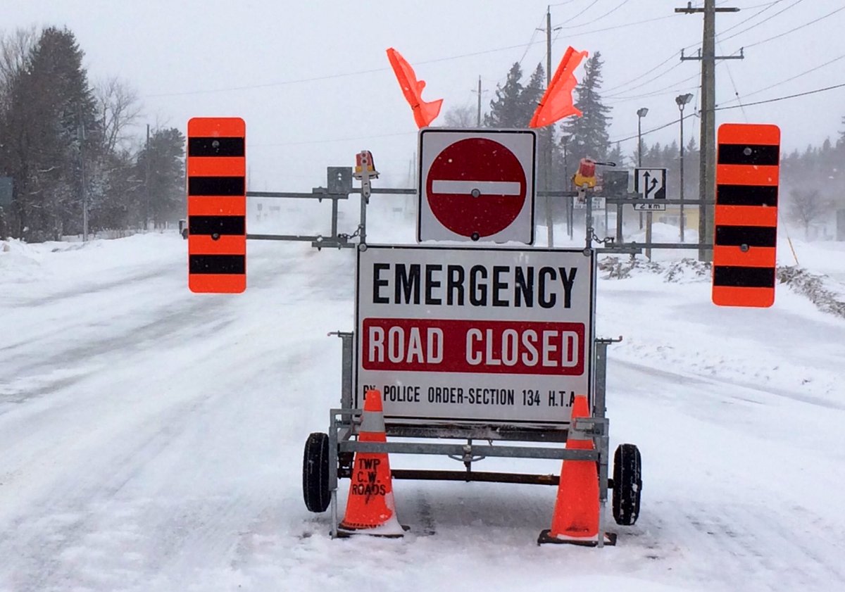 Road Closed - A long line of truck operators wait patiently for the sign to be removed to allow travel north of Fergus along Highway 6. OPP report the highway remains closed from Guelph to Chatsworth