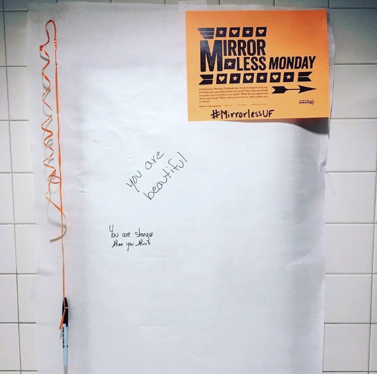 NCBHAC's tweet photo. We ❤️what @UFGatorWell is doing at @UF for #NationalEatingDisorderWeek. Mirrors across campus are covered for #MirrorlessMonday. Skip the mirror and write body-positive affirmations on the paper. Know that you’re great just the way you are!👊 #healthycampus #wellness https://t.co/CrVbKjGzhA