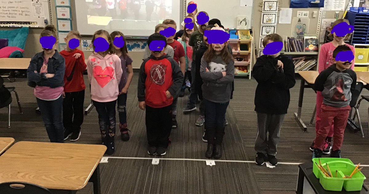 Jwestwood8's tweet photo. Students WERE the data in this line plot about siblings. The mustaches were handed out for White Ribbon week. We are math, reading, and media detectives today! #WeAreWasatch #MediaDetectives #TeachInDavis https://t.co/ssuX1uDlJH