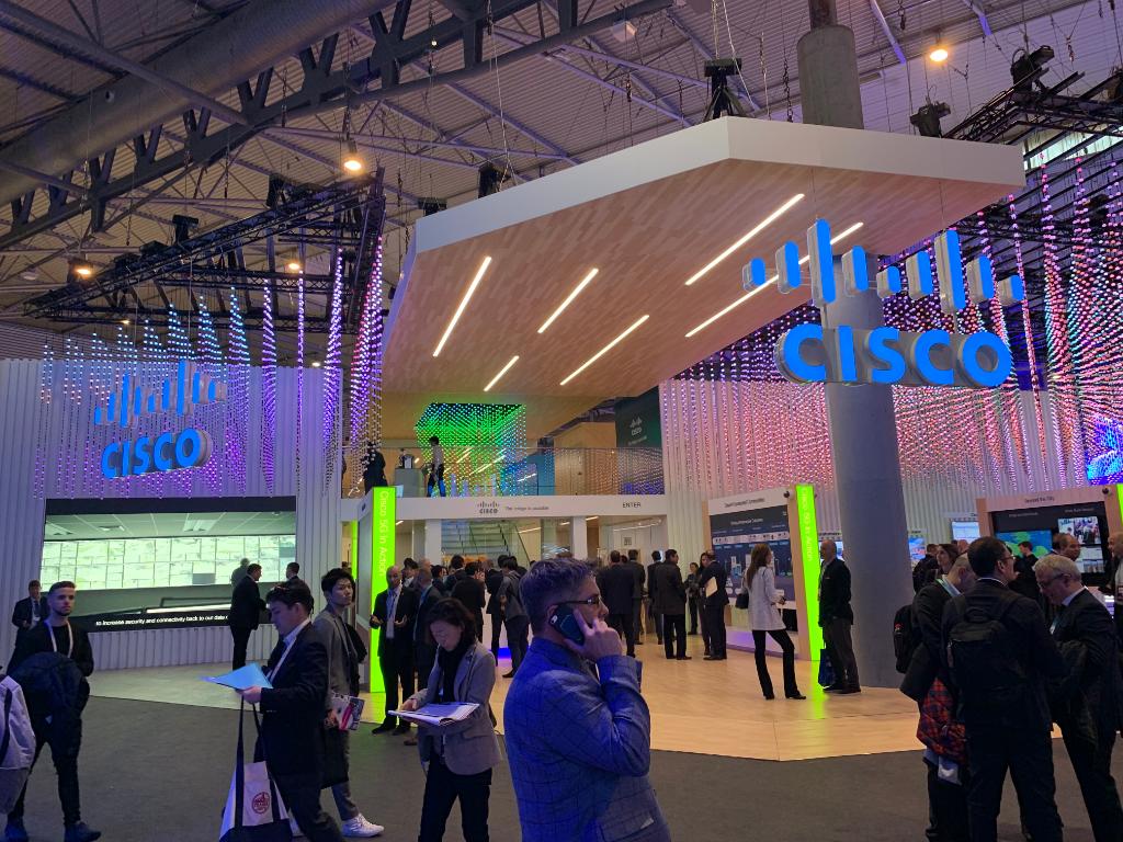 Cisco's tweet image. Not in Barcelona to get the latest Cisco news from #MWC19? Fear not. Stay up to date here: cs.co/6010Eps8G #CiscoMWC