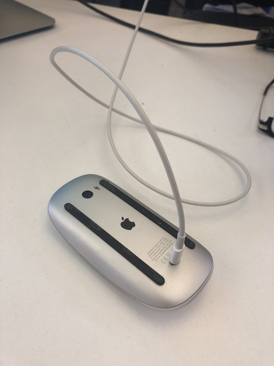 TheBeesk's tweet photo. I currently can’t use my mouse so I would like to use this time to keep @AppleSupport humble by reminding them that someone on their team thought this design was a good idea. https://t.co/pDyu9RtlX1