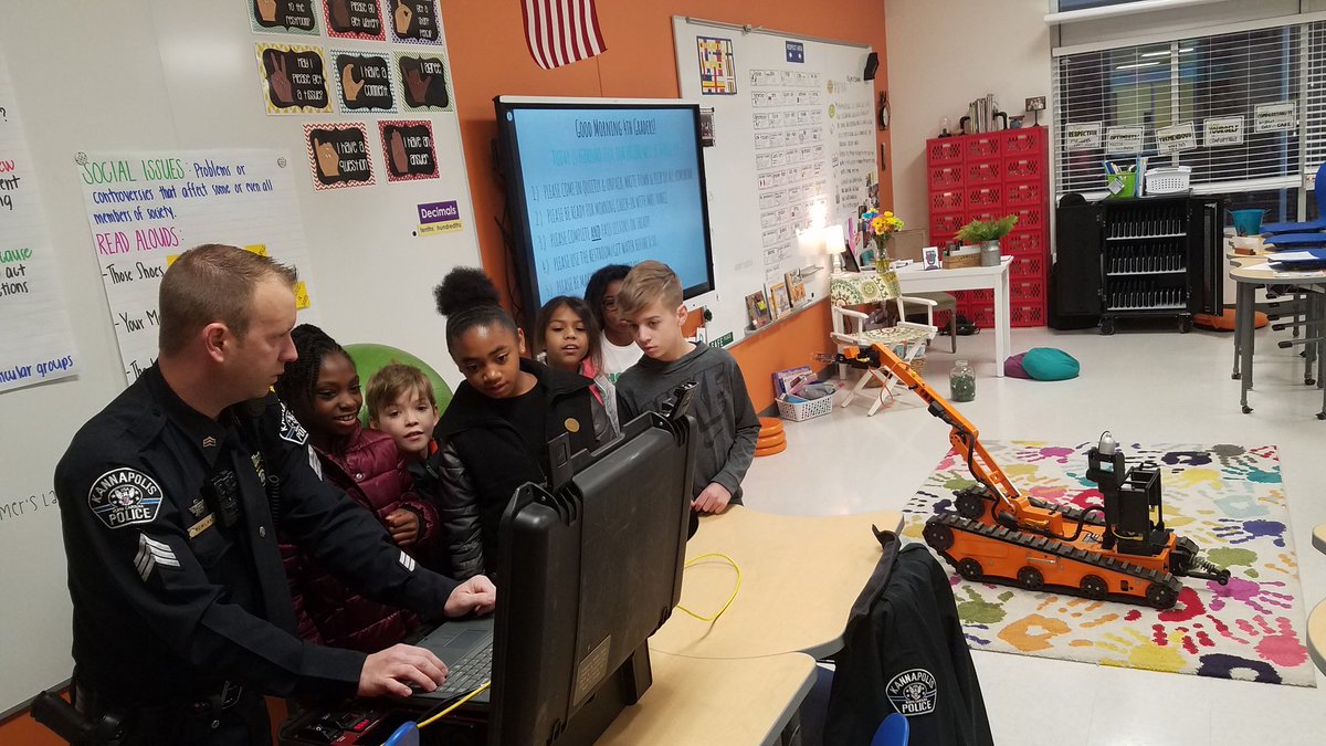 TeamDurand4's tweet photo. We are so grateful to have had these two officers come and support our VEX Robotics teams! We learned just how impactful robotics is to our everyday lives and the lives of our community! @TeamDurand4 @#EngagecreateSOAR @kannapolis911 #WestandRowland #CommunitySupport https://t.co/pW2AkA9fgz