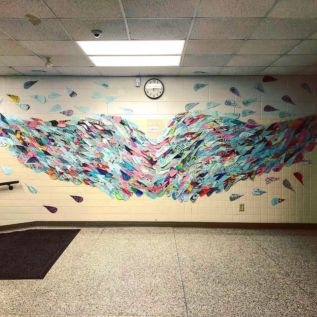 JenPerryBV's tweet image. The @hssdbv newest installation is a mural that includes a feather from each student surrounding the concept of peace and positivity in our middle school #whatliftsyou #peersonpositiveschools @HSSD
