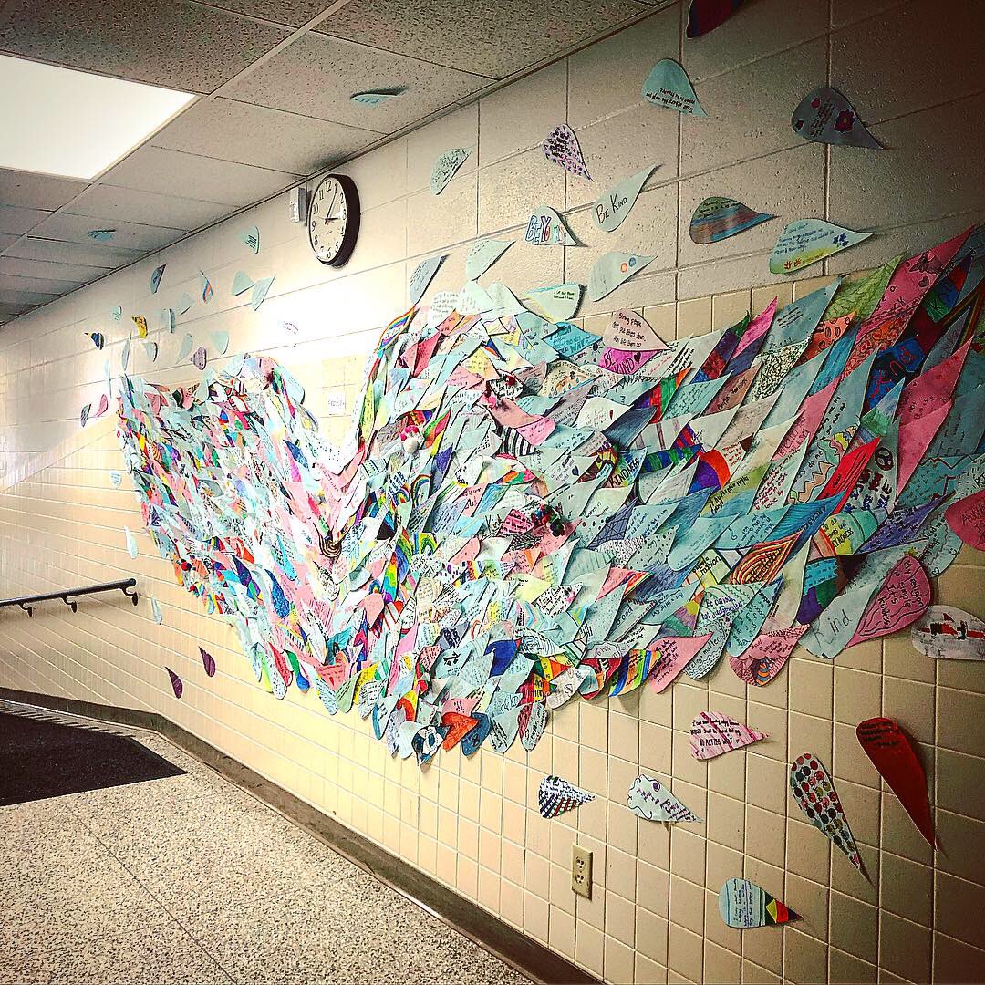JenPerryBV's tweet image. The @hssdbv newest installation is a mural that includes a feather from each student surrounding the concept of peace and positivity in our middle school #whatliftsyou #peersonpositiveschools @HSSD