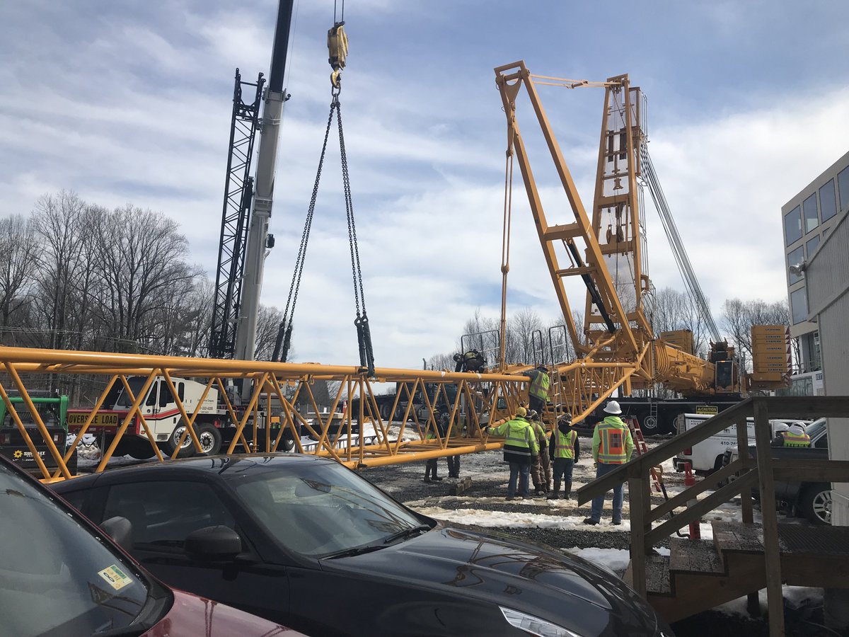 HITTContracting's tweet photo. What goes up, must come down. Using a 550 ton hydro crane at our General Dynamics project to disassemble the tower crane. #HITTBaseBuilding https://t.co/bQzMxfDxBZ