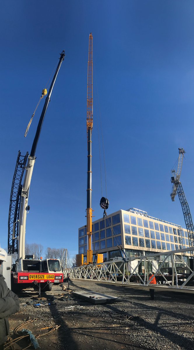 HITTContracting's tweet photo. What goes up, must come down. Using a 550 ton hydro crane at our General Dynamics project to disassemble the tower crane. #HITTBaseBuilding https://t.co/bQzMxfDxBZ