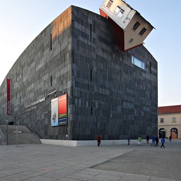 Place :House Attack (Vienna, Austria) Did You Know: House Attack was an architectural installation created in central Vienna, Austria. Austrian artist Erwin Wurm getyouthebest.com #photography #travel #Wanderlust #Vacations #holiday #architecture #architect #Weird