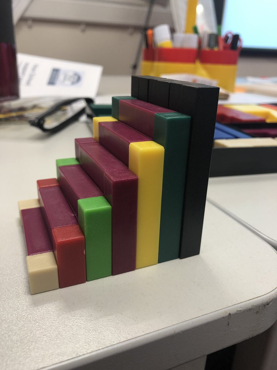 Making a staircase out of cuisenaire rods... love a @WhiteRoseMaths team meeting! #TheBigShare