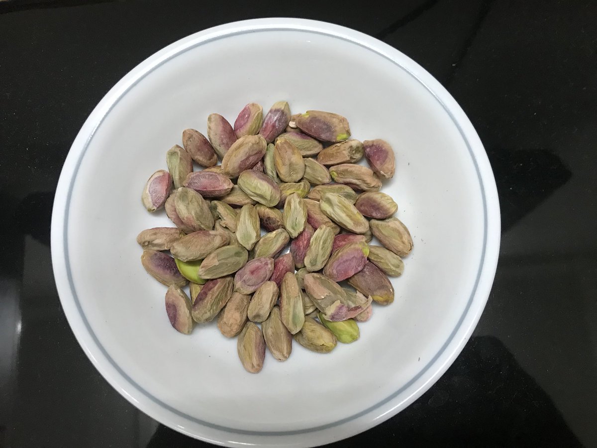 Peacock colours in a bowl
Its virtues the dieticians extol 
A part of salads, sweets and creamy rolls 
But I just love to eat them whole

#WorldPistachioDay